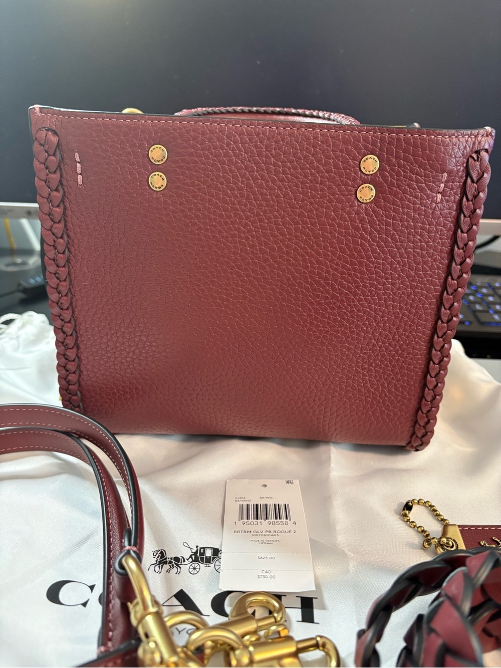 Coach Pebbled Leather Braided Rogue 20 in Wine with Gold Hardware